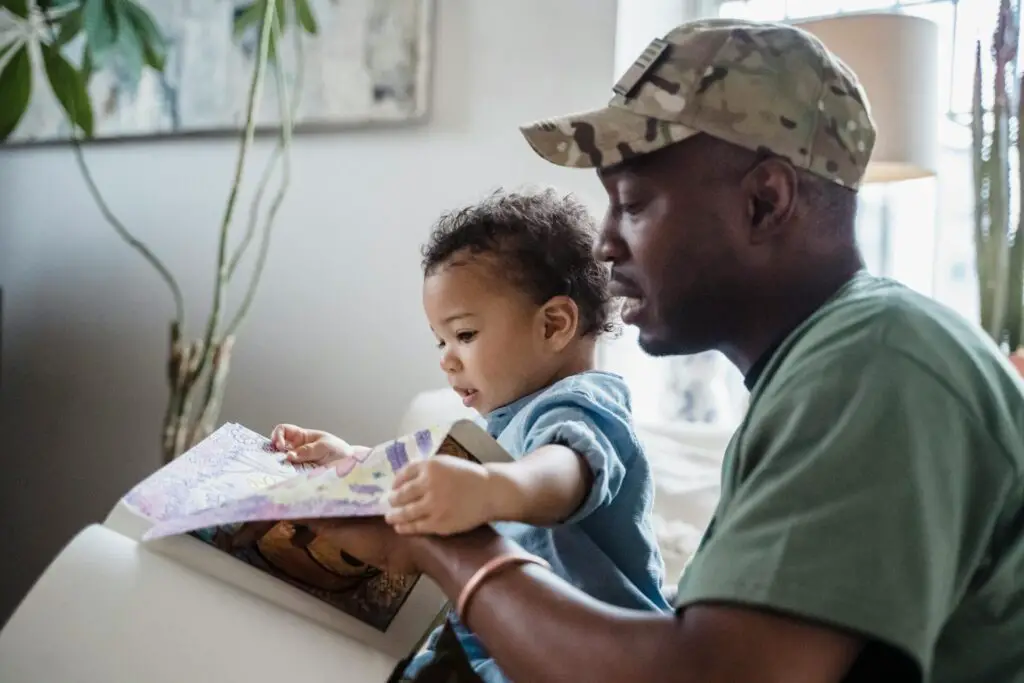 a man and child reading a book